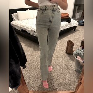 Asymmetrical High rise, straight leg, light wash denim jeans